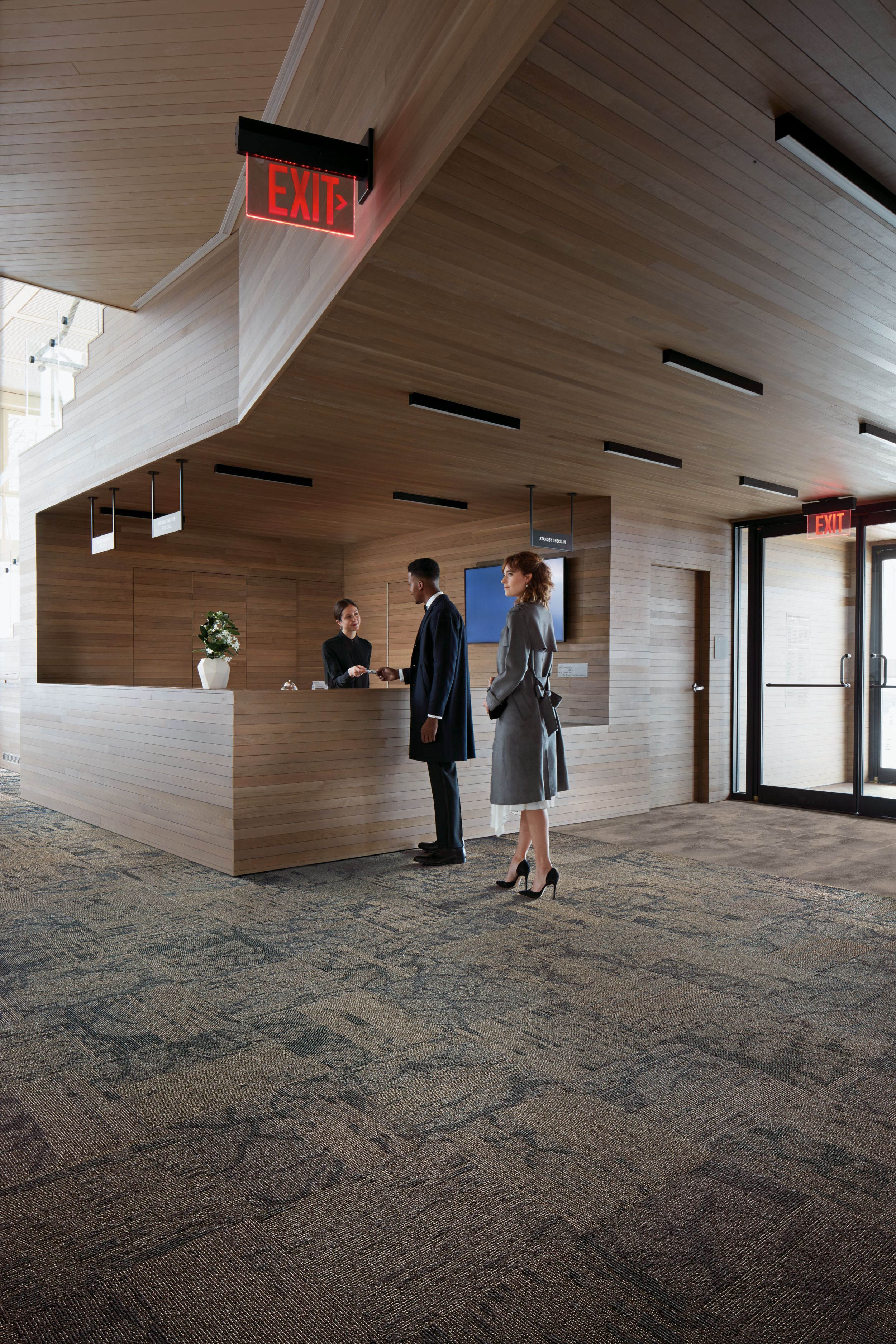 Interface Ground plank carpet tile and Natural Stones LVT in reception desk near entry doors image number 6